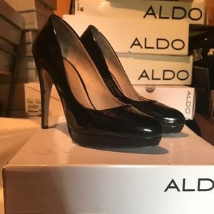 Aldo “Wagaman” almond-toed black patent heels